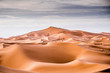 © Oscar Carrascosa/ADDICTIVE STOCK - Landscape of desert with sand hills in Marrakesh and camels resting in the distance, Morocco