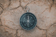 © Pol Sole/ADDICTIVE STOCK - From above big round compass pointing to north on desert place in semi-desert Bardenas Reales Navarra Spain