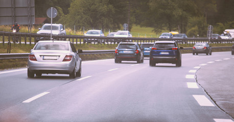 Cars driving on highway in traffic jam