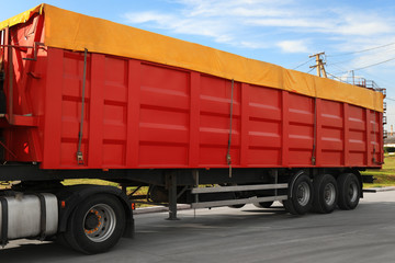 Modern bright truck parked on country road