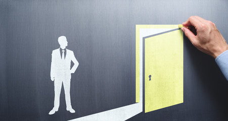 Wall Mural - Opening door to success. Coaching and advice concept. Drawing door on chalkboard.