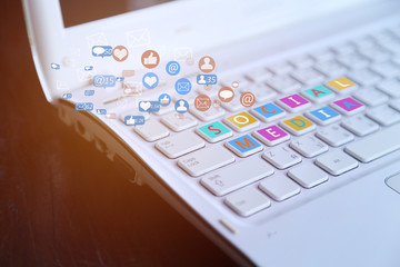 social media logotype collection printed and placed on modern computer keyboard