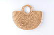 © One Pixel Studio - Women's straw bag isolated on white background