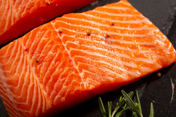 Two slice of fish on slate close-up