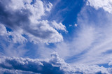 Fototapeta Niebo - beautiful clouds on the bright blue sky