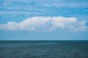 Wall Mural - Sea and sky with big clouds