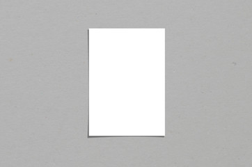 Blank white vertical paper sheet 5x7 inches with shadow overlay. Modern and stylish greeting card or wedding invitation mock up.