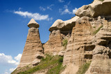 Fototapeta Sawanna - Amazing sandstone formations in Cappadocia, Turkey. View in sunny weather.