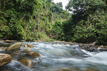 Ton Kloi Waterfall in the forest naturally comfortable, at Ban Siam , Ranong Thailand,Used in editing create a graphic,Creative travel business.