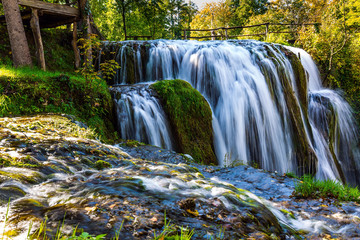 Sticker - The small Croatian town of Slunj. Magnificent cascade of waterfalls on the Koran River. Magnificent The dense forests