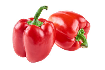 Two fresh peppers isolated on white background. Background of organic food.