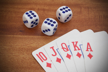 Playing cards and dices close up