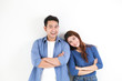 © chayathon2000 - Asian couple in blue shirt on white background  happy and smile mood