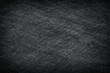 © prapann - Dark grey black slate abstract background or texture.