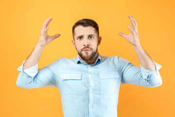 Wall Mural - Stressed man on color background