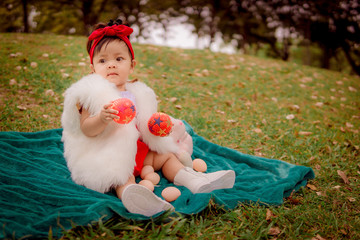 portrait of a girl. Happy little girl in autumn park. Fashion Kid outdoor.