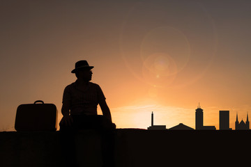 Wall Mural - Traveler in front of city skyline of Fresno