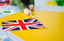 School Children. Little Girl With A Flag Of Great Britain. Education In The United Kingdom. Learn English.