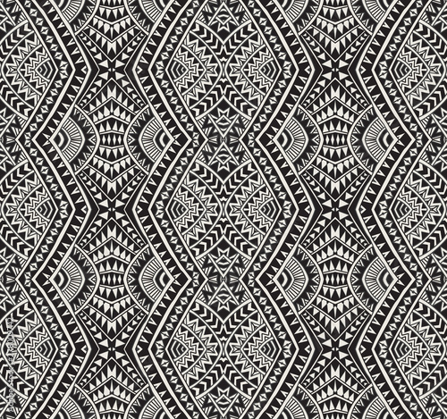 Cuadros en Lienzo Vector abstract seamless pattern from black, grey and light beige ikat geometrical shapes, rhombus, triangles, Maori ornaments, waves, stripes