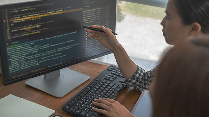 programmer working in a software development and coding technologies. website design.technology conc