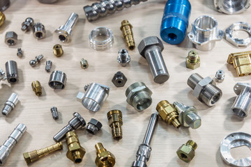 background of different metal products for metal working: cutters, connectors, nuts, fittings, fasteners, etc.