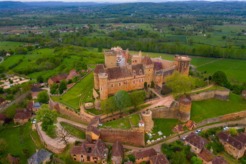 Sunset in front of a Castle. Château de Castelnau-Bretenoux is a castle in the commune of Prudhomat, Lot département, France. One of the most impressive in the Quercy region, Prudhomat, Lot department