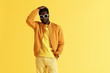 © puhhha - Fashion portrait black man in clothes, sunglasses on background