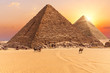 The Pyramid of Menkaure and the Pyramid of Khafre in the sunset rays, Giza desert