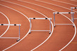 Hurdles on a bend of an athletics stadium race track
