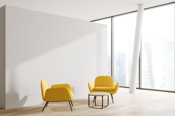 White office waiting room corner, yellow armchairs