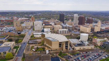 Soft white clouds appear after rain storm in downtown Akron, Ohio