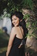 © Yun Heng Lin/Scopio - woman in black dress near bamboo plant