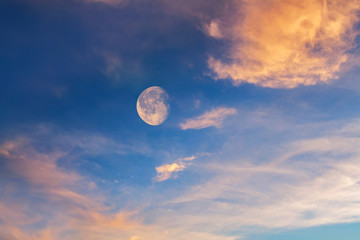 white moon over stormy clouds . dramatic nature background . full moon background . landscape . ecli