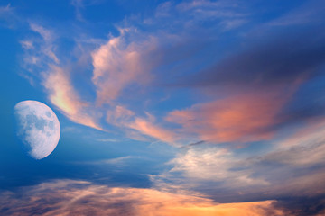 white moon over stormy clouds . dramatic nature background . full moon background . landscape . ecli