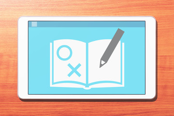 Aufkleber - E-learning concept image. Tablet computer on wooden desk. Application of problems collection on screen. Front view image.