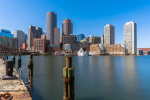 Scene Of Boston Skyline From Fan Pier At The Afternoon With Smooth Water River, Massachusetts, USA Downtown Skyline, Architecture And Building With Tourist Concept