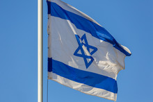 Close Up View On White And Blue Flag Of Israel