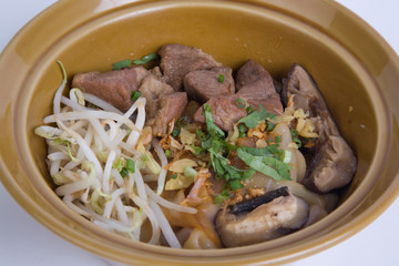 Stewed pork soup with morning glory and bean sprout.