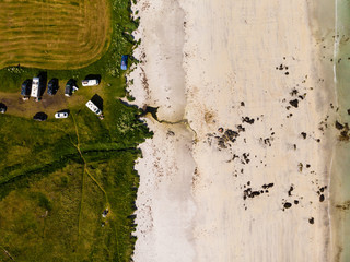 Sticker - Aerial view. Sandy beach with parking area