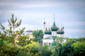 green domes of russian church with crosses