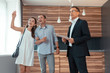 © Viacheslav Yakobchuk - Realtor speaking about the house to just married couple