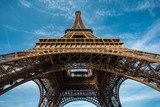 Fototapeta Boho - Wide shot of Eiffel Tower with blue sky, Paris, France.