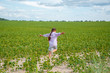 © QKon Studio - Little cute girl running across the soybean field, summer