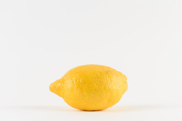 Lemon with water drops on white background. Citrus fruit. Healthy freshness food. fruit with vitamin