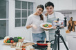 © Peera - Vlogger and blogger cooking job concept