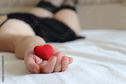 Red Knitted Heart In Female Hand Romantic Love Seductive