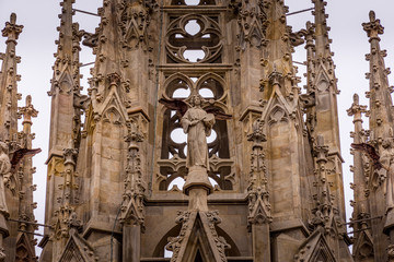 Wall Mural - The Cathedral of Barcelona, detail of the main spire in typical gothic style with stone friezes and gargoyles. Barri Gotic, Barcelona.