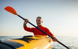 © yossarian6 - Active senior man paddling kayak