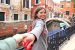 Lovers walking on Venice streets. Happy romantic vacation in Italy. Couple enjoying in Venice