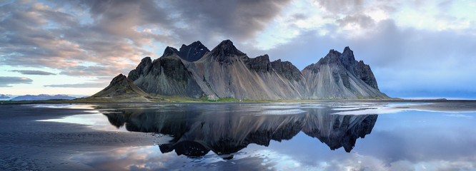 sand dunes on the stokksnes on southeastern icelandic coast with vestrahorn (batman mountain). icela